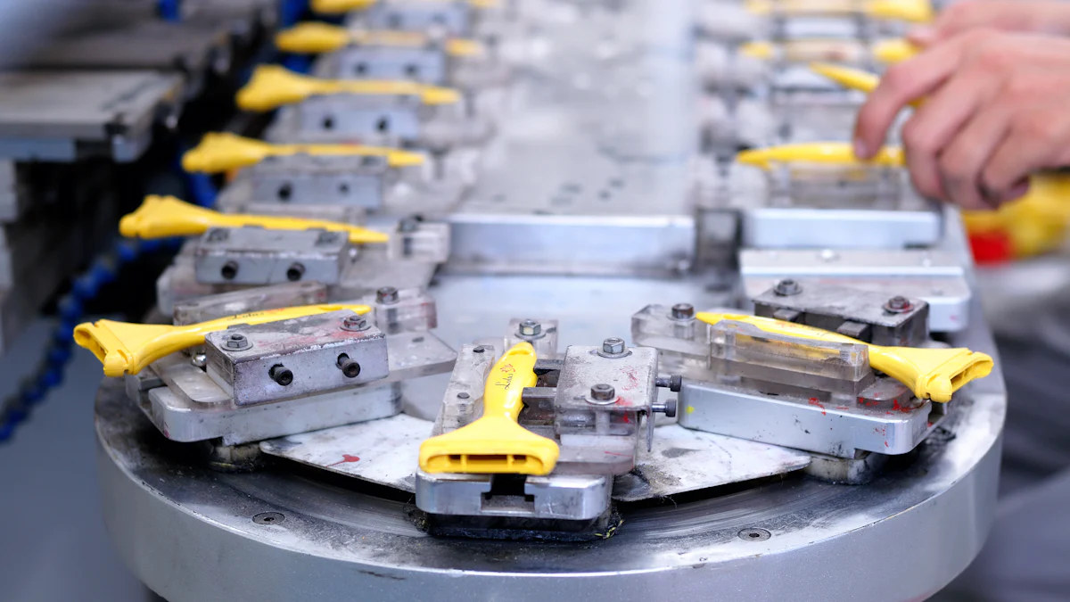 An operator loading parts into a rotary indexing fixture with clamped workholding on a machining line