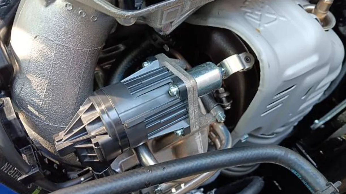 Machined aluminum engine component mounted in an engine bay, a typical A319 service duty