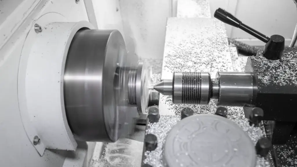 The CNC machine is drilling
